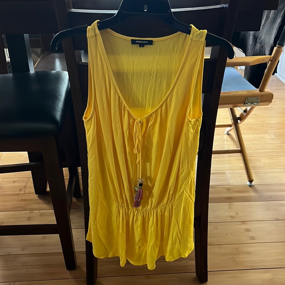 Yellow top in mint condition size M with needs and tassel